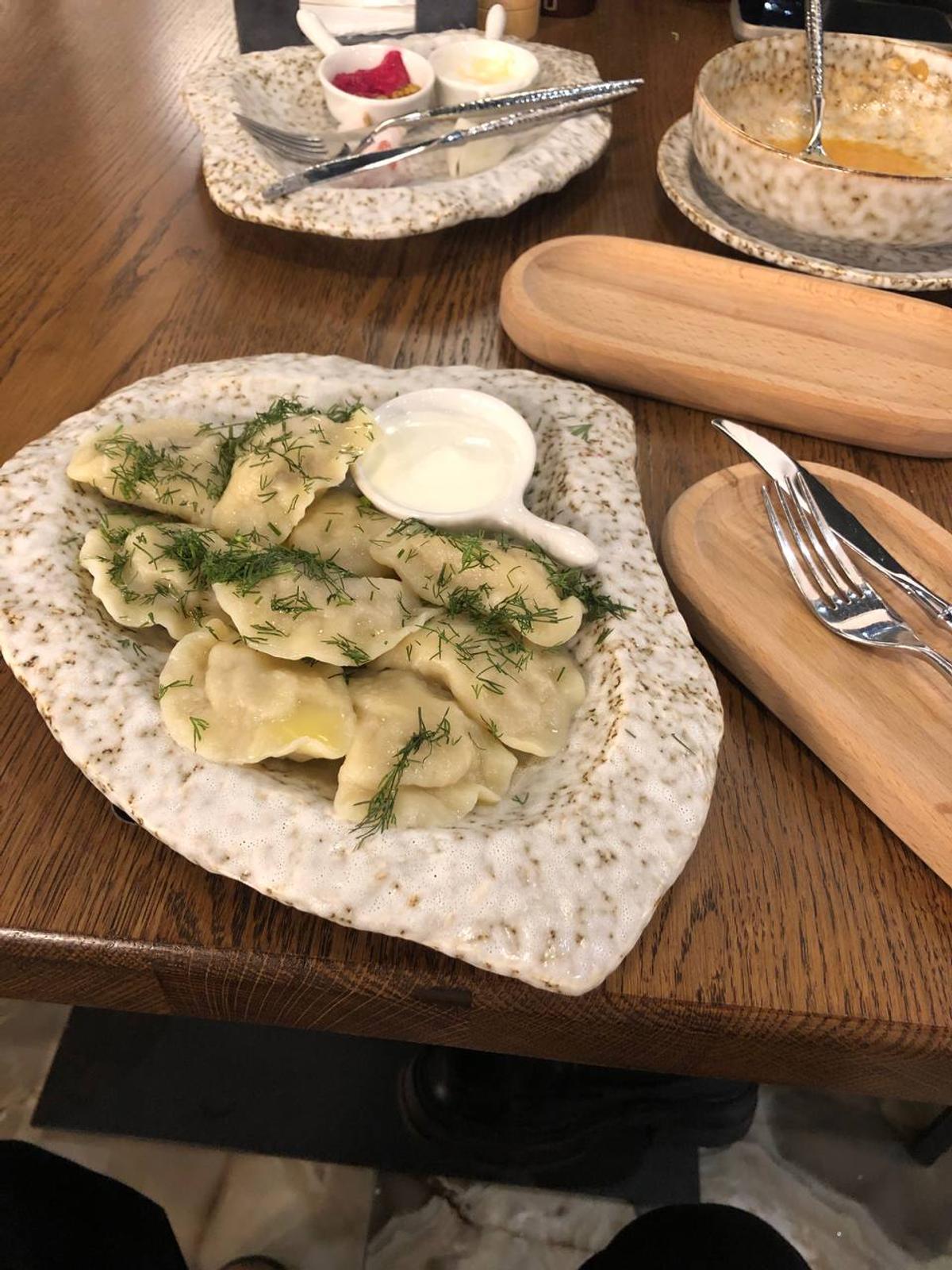Vareniki with butter and parsley