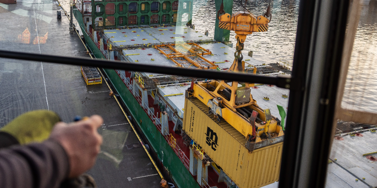 Our crane lifting a container
