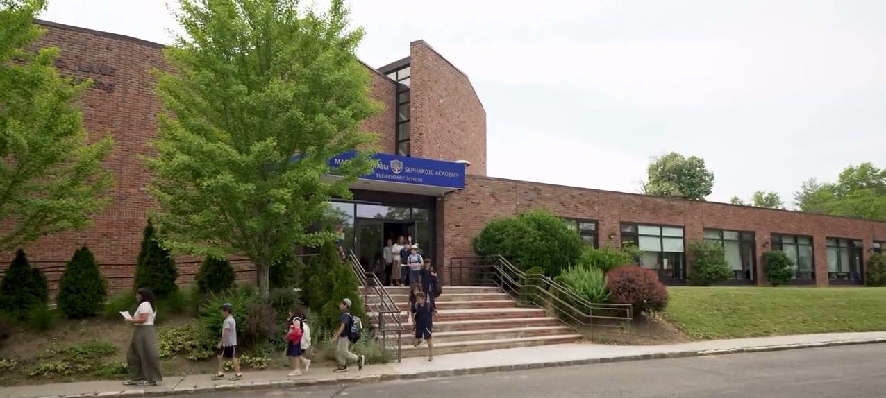 Students outside the school on Hicks Lane