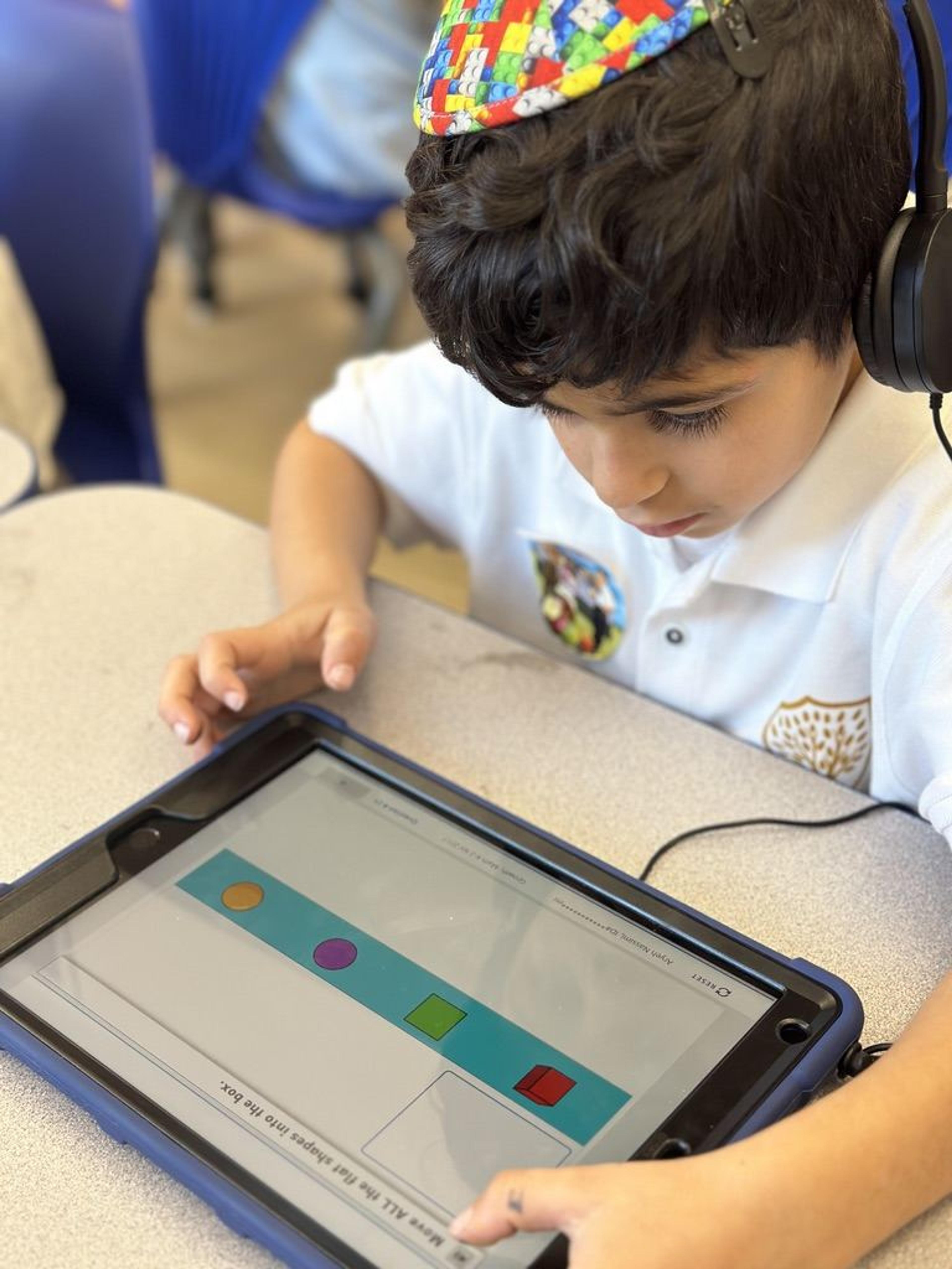 A student working on a tablet