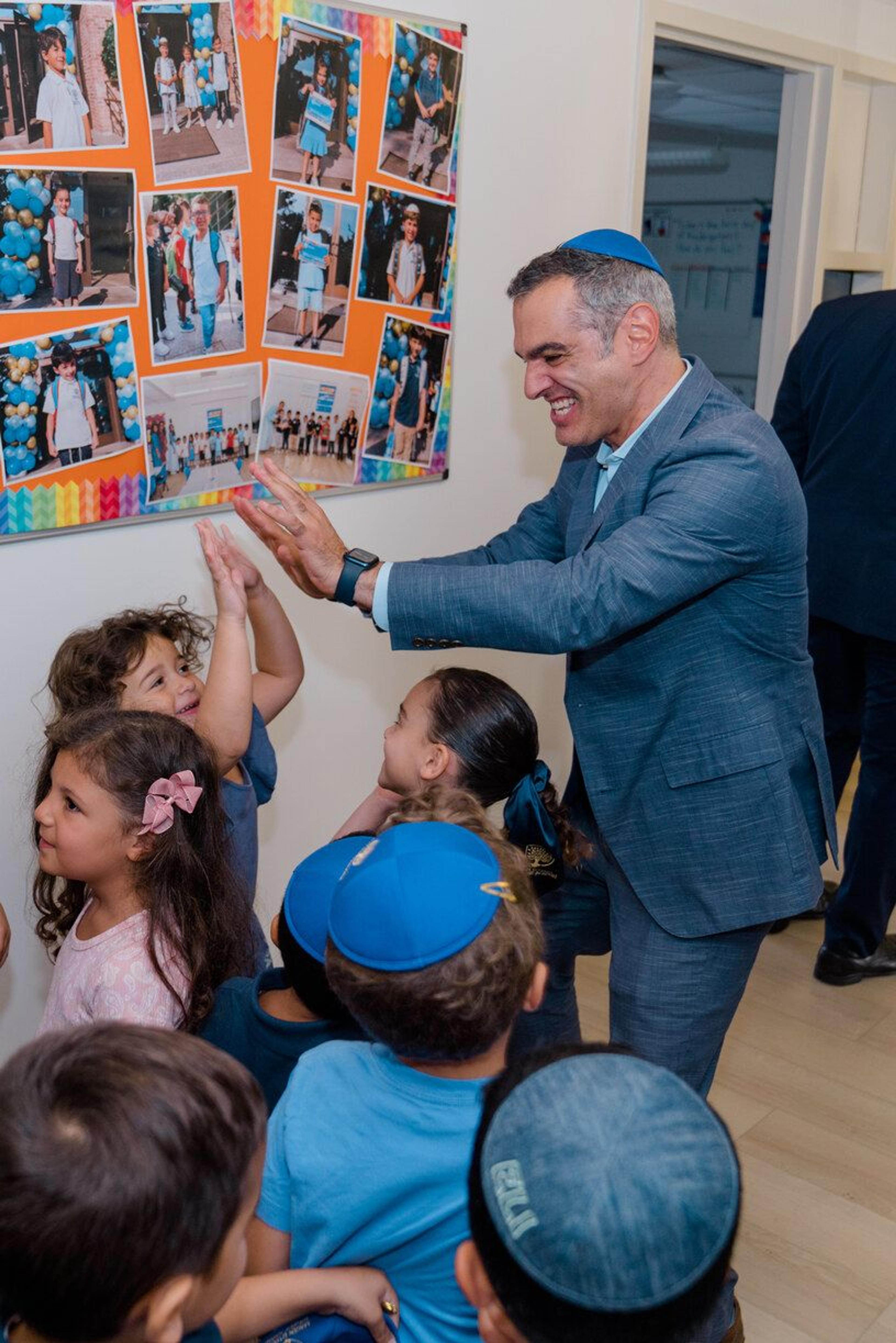 Students greeting a visitor