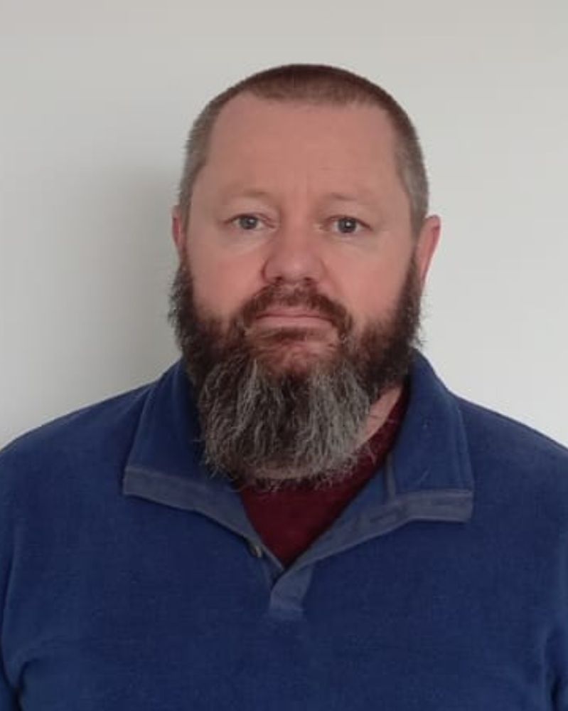 A portrait photo of IB Head of Math, Clem