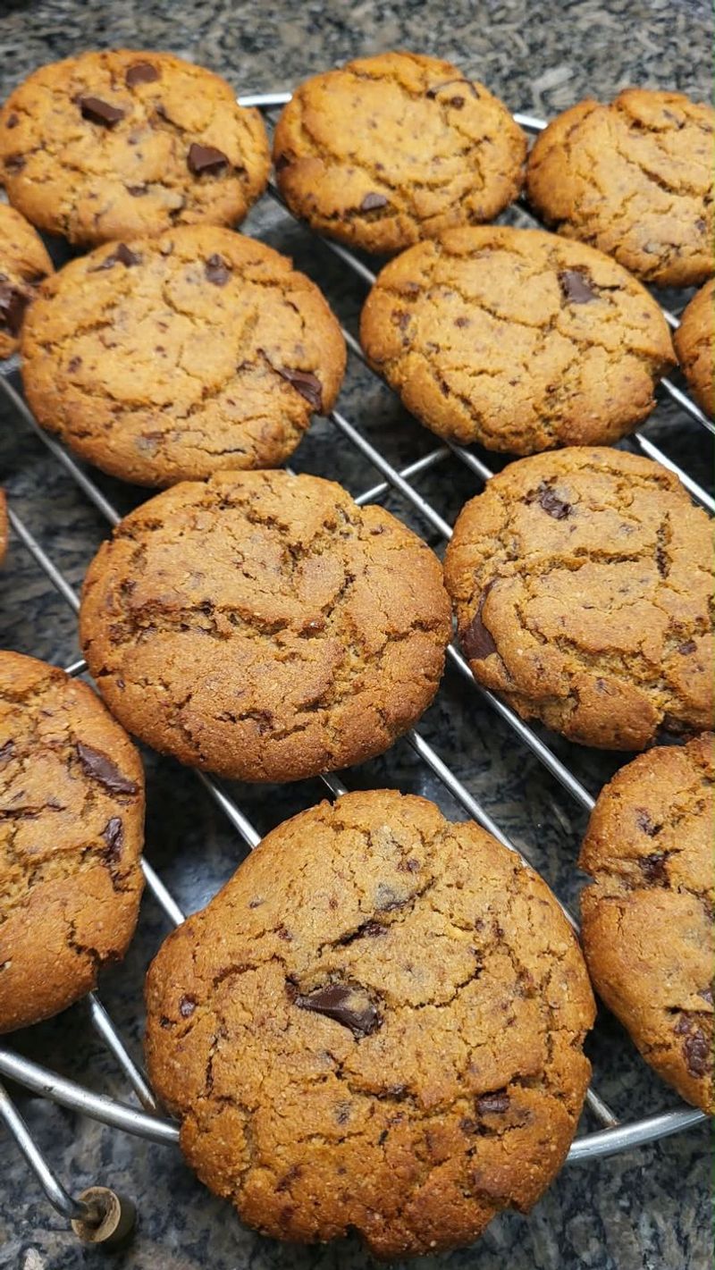 Single chocolate cookies on a rack