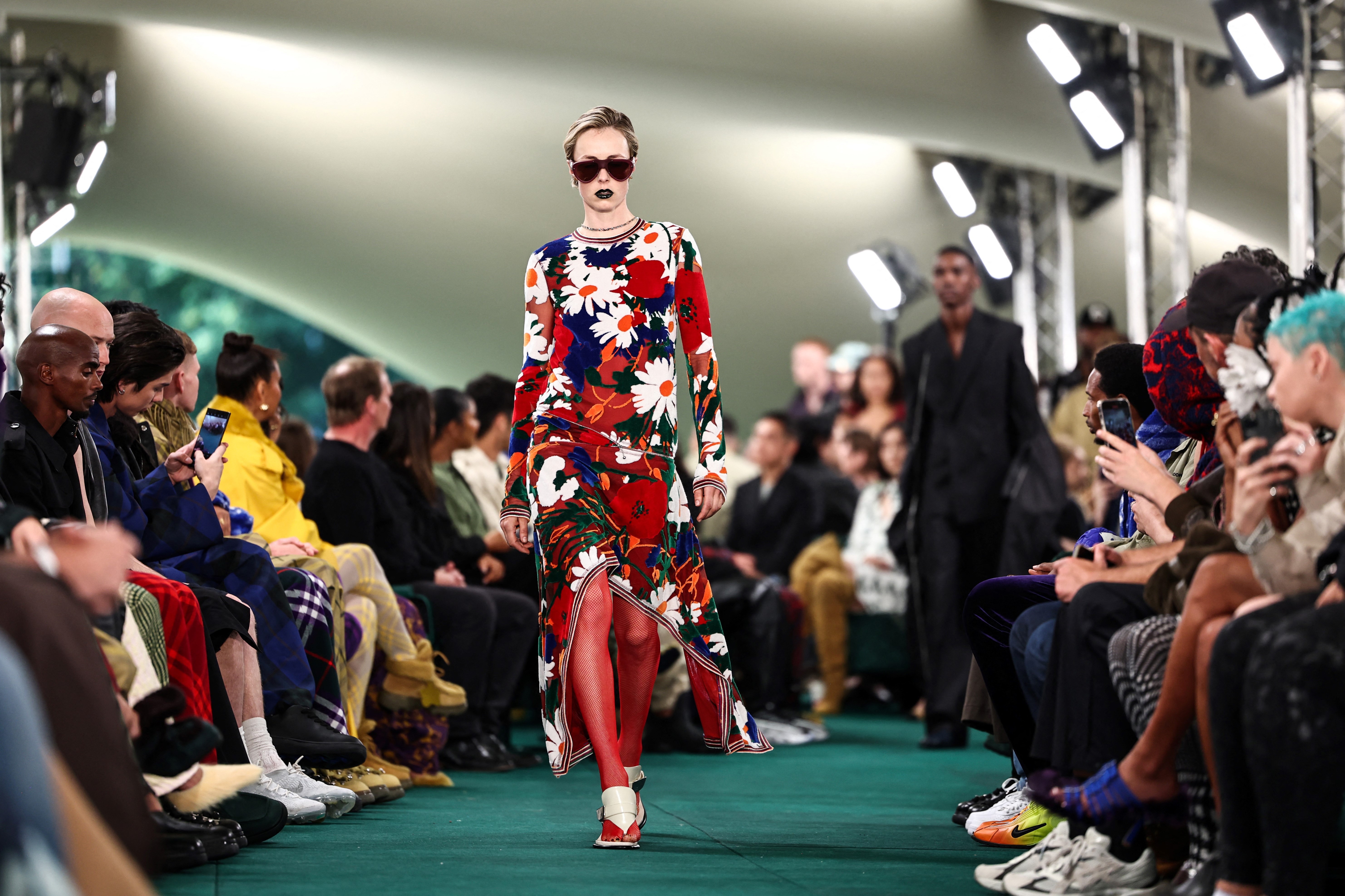 Models present creations during a catwalk presentation for British fashion house Burberry's Spring/Summer 2024 collection, at London Fashion Week in London, on September 18, 2023. Image: Getty Images