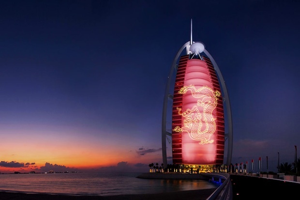 Jumeirah's Burj al Arab in Dubai illuminated its famous "sail" for the Chinese Year of the Dragon