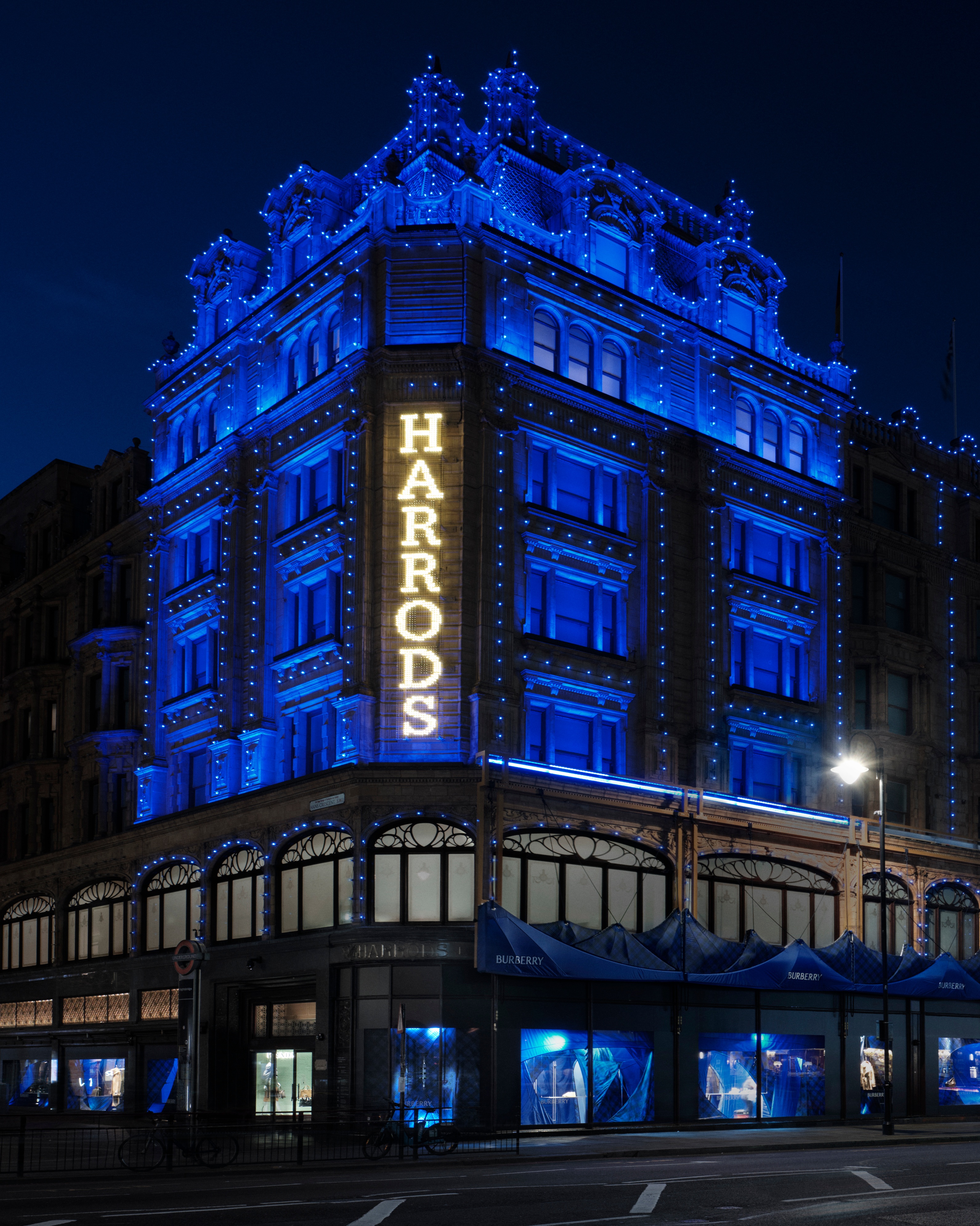 Harrods is lit up in Burberry Knight Blue for February 2024. Photo: Harrods