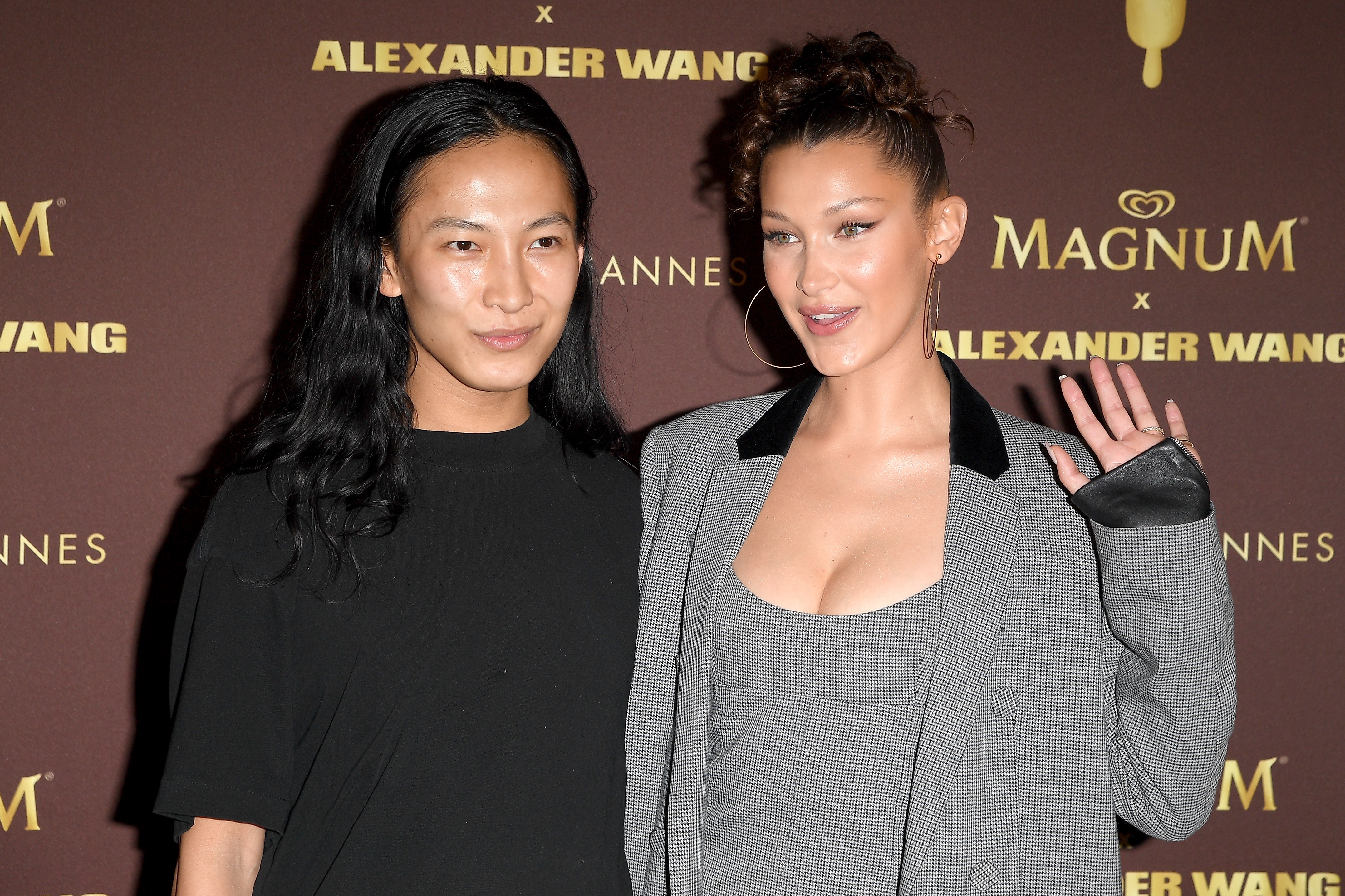 Designer Alexander Wang, left, and model Bella Hadid attend the Magnum VIP party during the 71st annual Cannes Film Festival on May 10, 2018 in Cannes, France. Photo: Ghetty Images