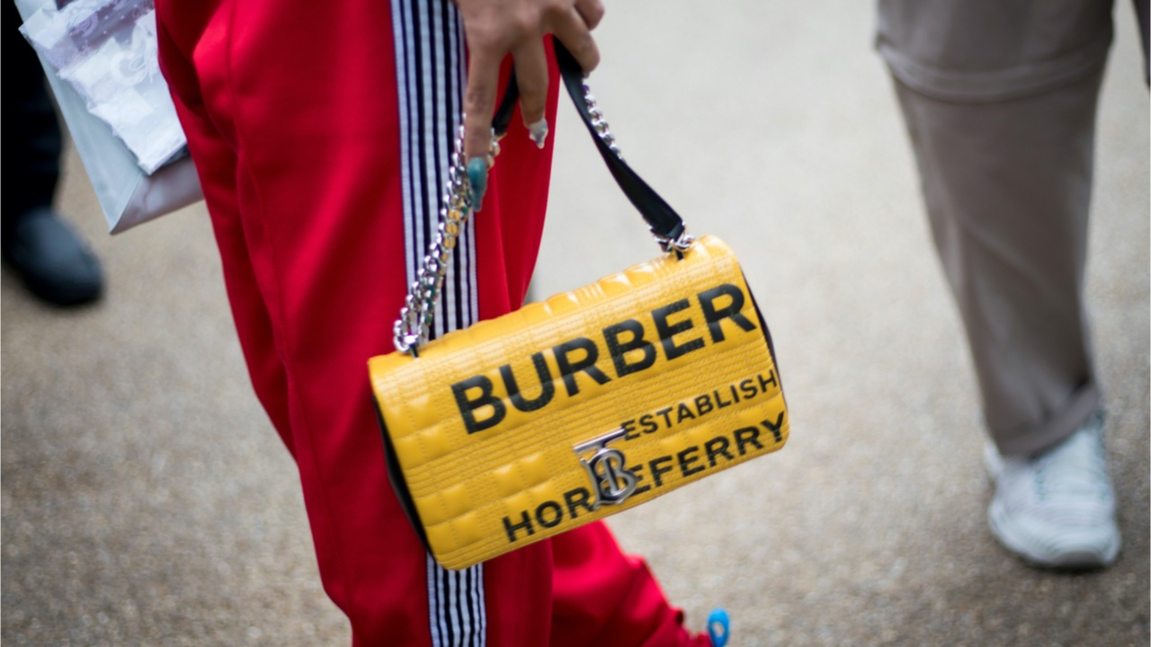 Burberry announcement an exclusive partnership between Burberry and the Chinese technology powerhouse, Tencent, to develop social media retail in mainland China. Photo: Shutterstock 
