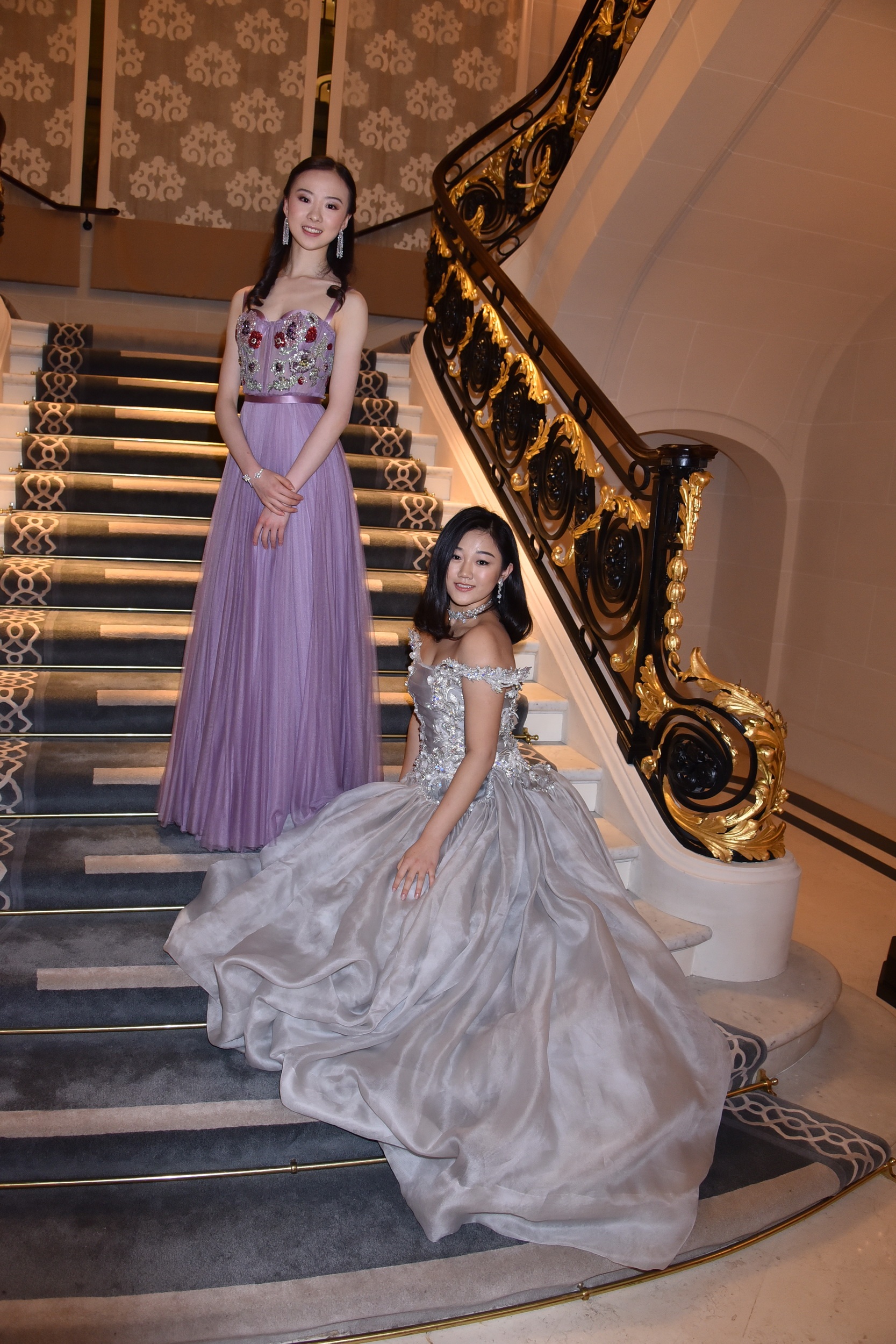 Ballet star Hang Yu (L) in an Alexander McQueen gown and Payal New York jewelry and Donna Yuan (R) in Guo Pei. (Jean Luce Huré/Courtesy Photo)