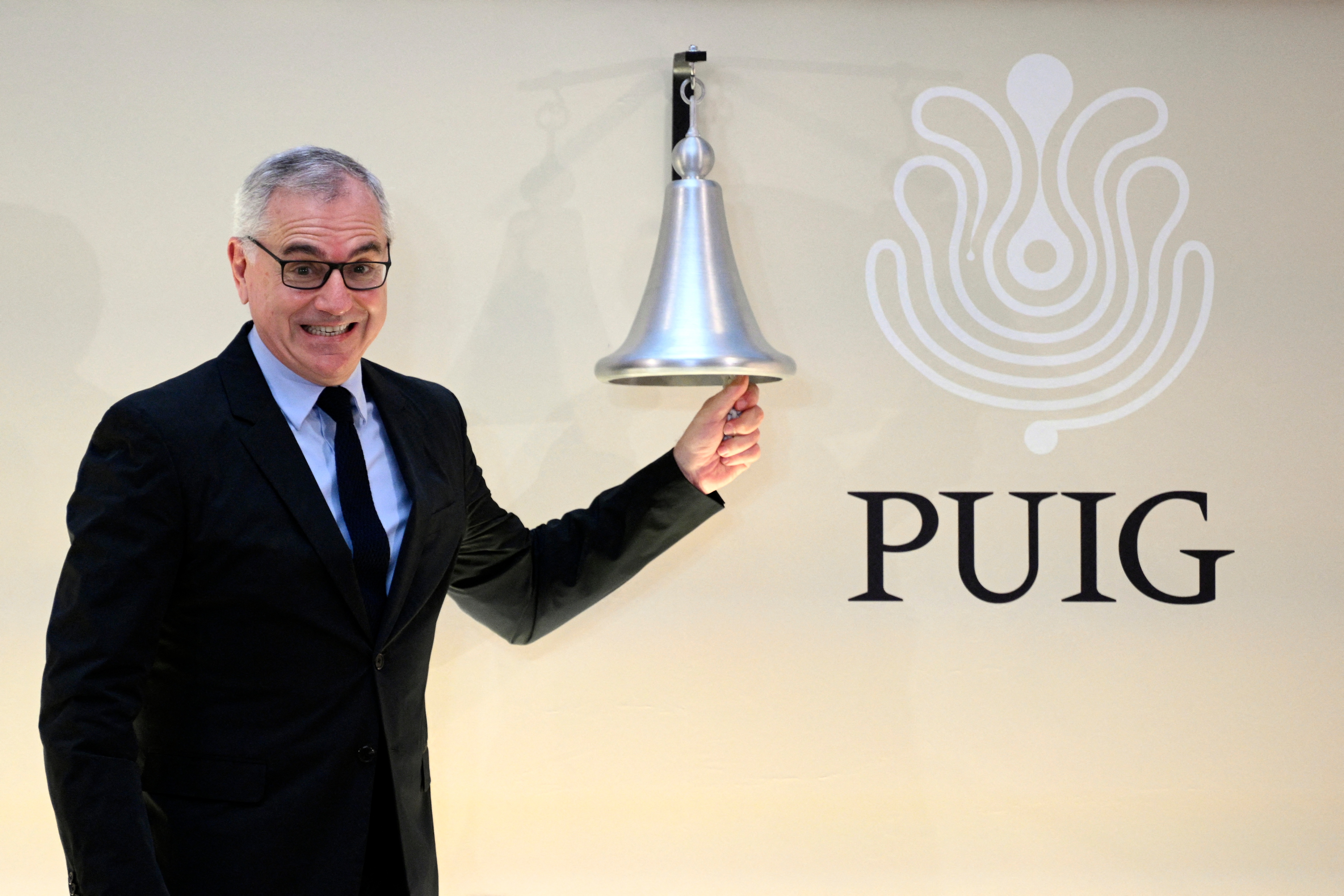 CEO of Spanish fashion and beauty group Puig, Marc Puig, rings the bell during the initial public offerings of the company on May 3, 2024, in Barcelona. Photo: Getty Images