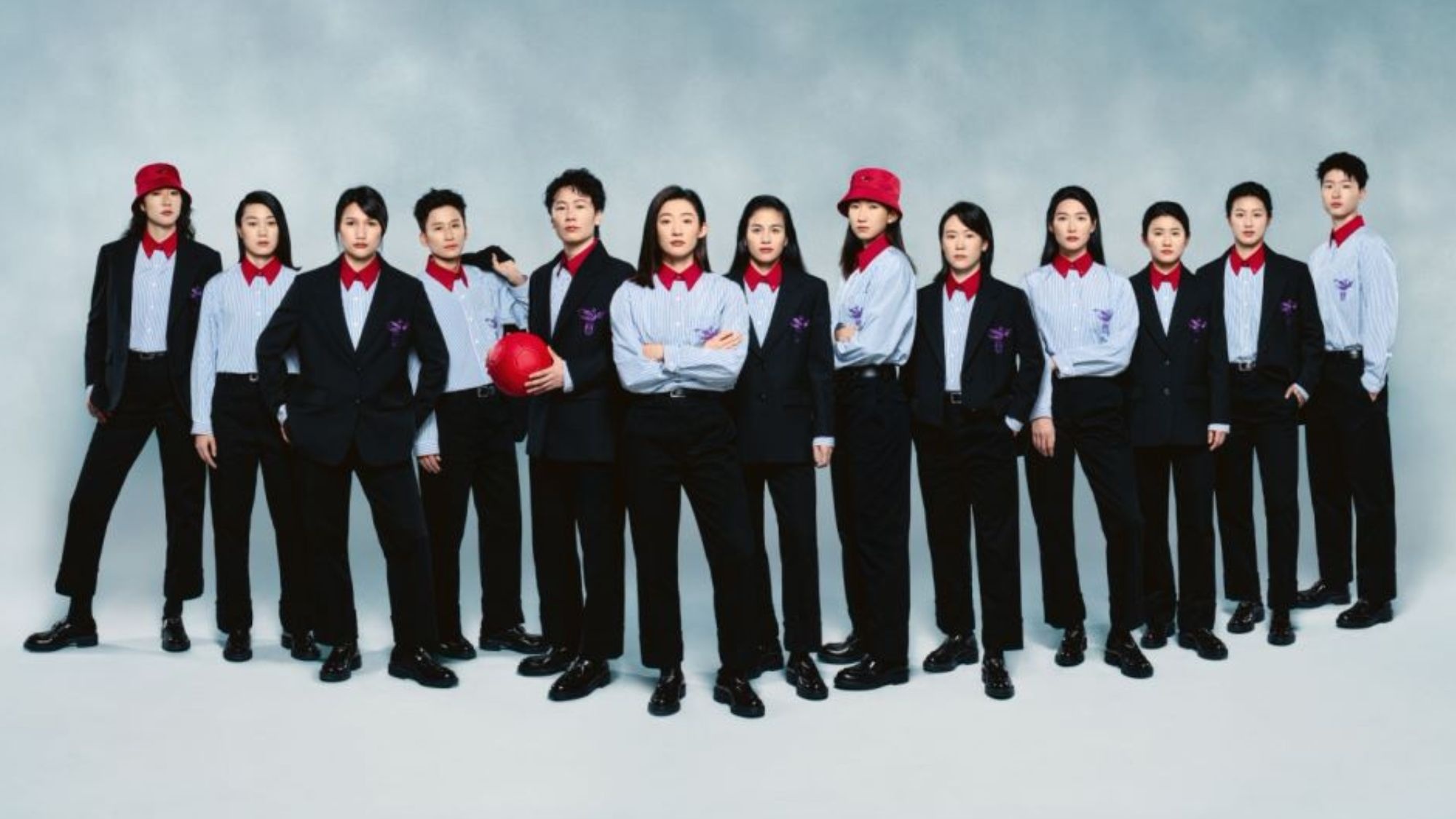 Women's football players Chen Qiaozhu, Dou Jiaxing, Lou Jiahui, Liu Yanqiu, Xu Huan, Wang Linlin, Yang Lina, Yao Lingwei, Wang Yanwen, Yan Jinjin, Yao Wei, Zhang Rui and Zhu Yu in new uniforms tailor-made by Prada. Photo: Prada