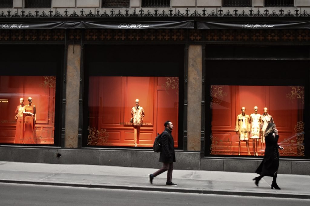 The Saks Fifth Avenue's Chinese New Year windows are very auspicious in red and gold. The windows feature Stella McCartney and Valentino (left), Gucci (middle), and Prada (right). Photo: Huixin Deng