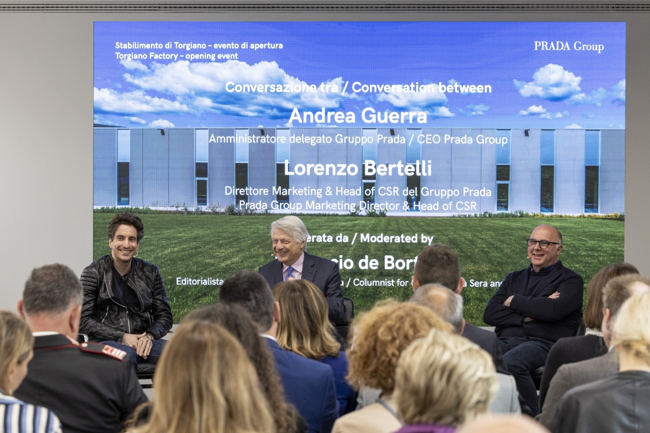 From left, Lorenzo Bertelli, Ferruccio de Bortoli, and Andrea Guerra attend the unveiling of the Torgiano knitwear hub in May. Image: Prada
