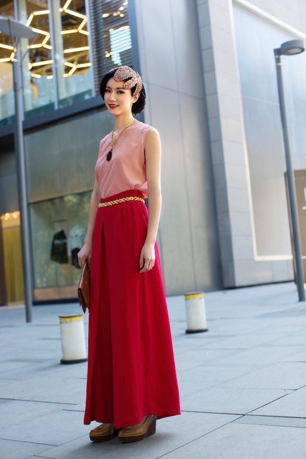 Karen Leung, the co-founder of Beijing luxury vintage shop House of Willow, models a look from the shop. (Courtesy Photo)