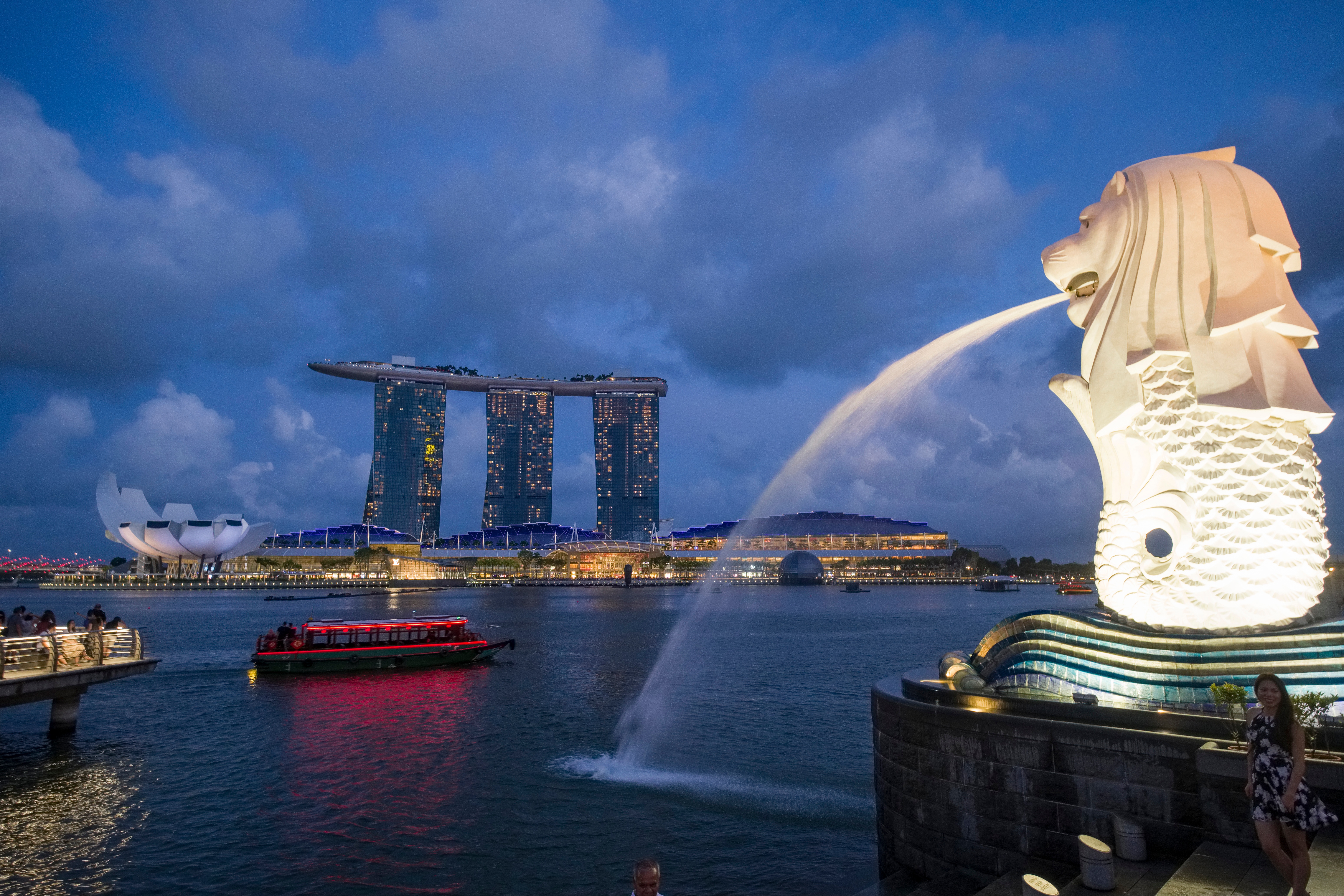 The Merlion statue representing a mythical creature with a lion’s head and the body of a fish, is pictured in Singapore’s Marina Bay. Image: Getty Images 