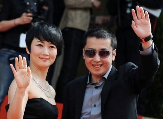 Director Jia Zhangke and actress Zhao Tao at Cannes (Photo: 新浪)