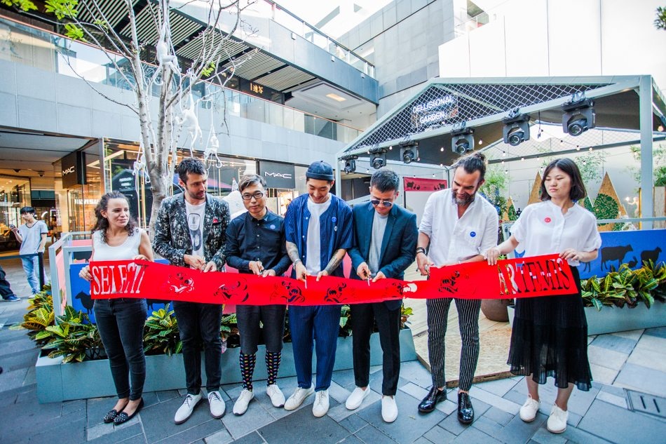 The Artemis team joins Stefano Seletti (second from right) in a ribbon cutting ceremony to kick off their afternoon tea event earlier this month. (Courtesy Photo)