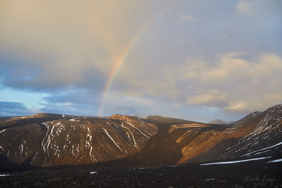 Regenbogen über dem Lavatal