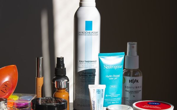 white and blue plastic bottle