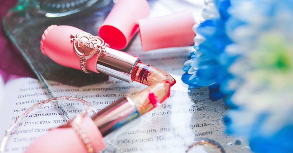 two pink lipsticks on table