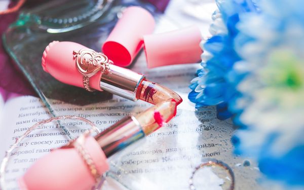 two pink lipsticks on table