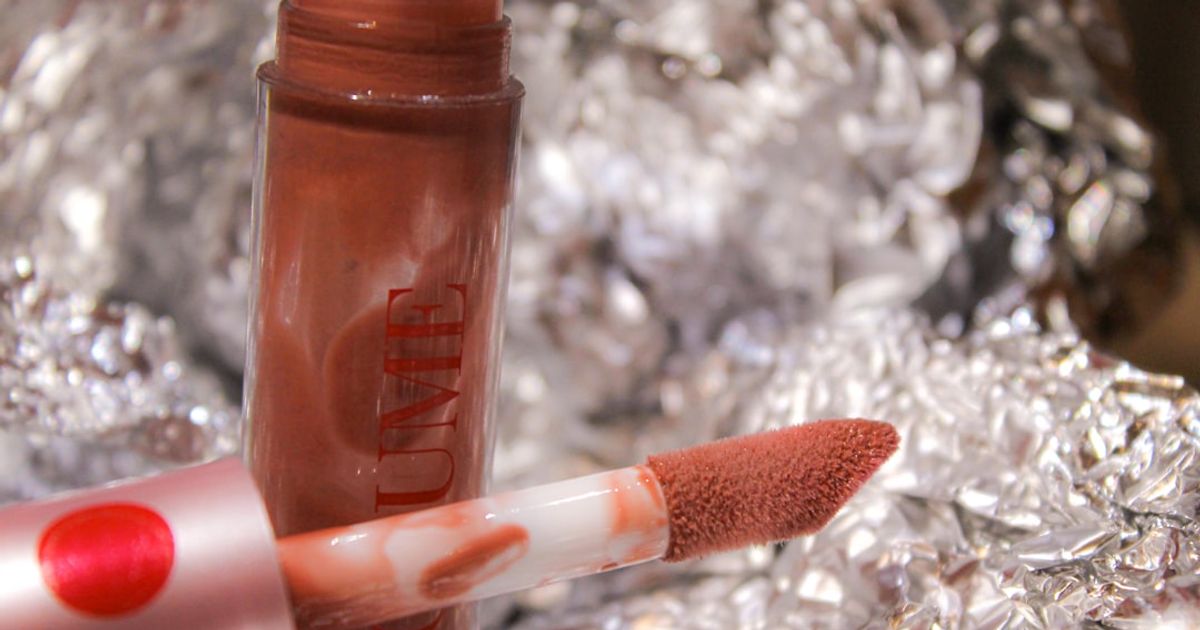 a close up of a lipstick on a piece of tin foil