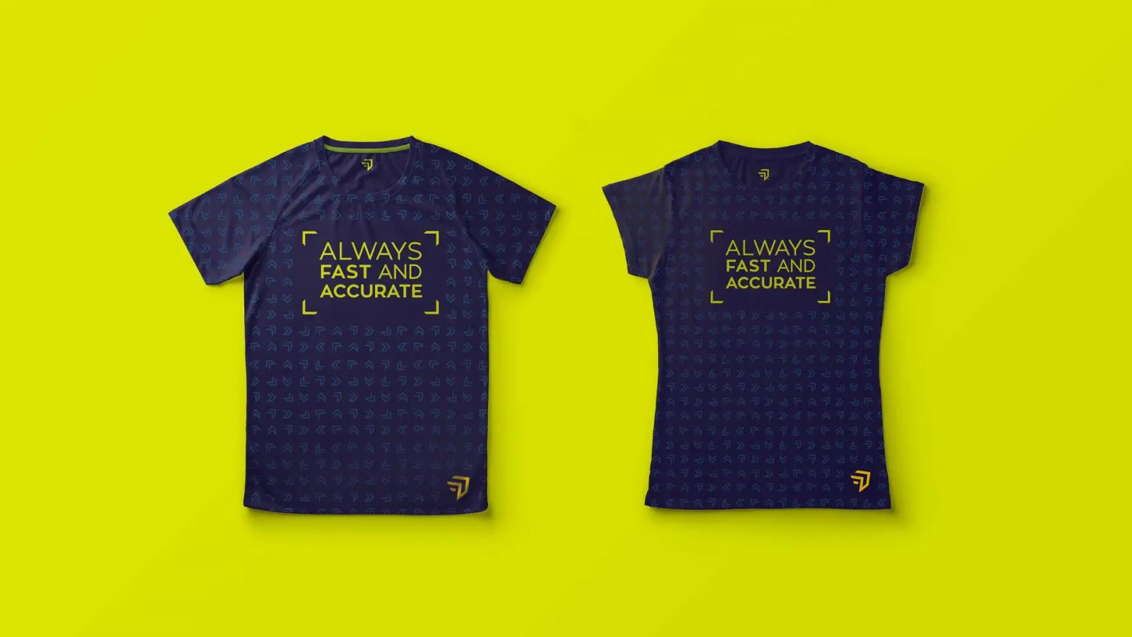 Dos camisetas deportivas de color azul oscuro sobre fondo amarillo neón, estampadas con un patrón de flechas sutiles y el eslogan central 'Always Fast and Accurate' en amarillo junto al logotipo de la marca en la parte inferior