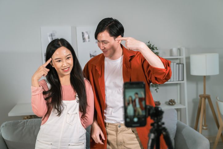 A couple uses royalty-free music for their Instagram reels