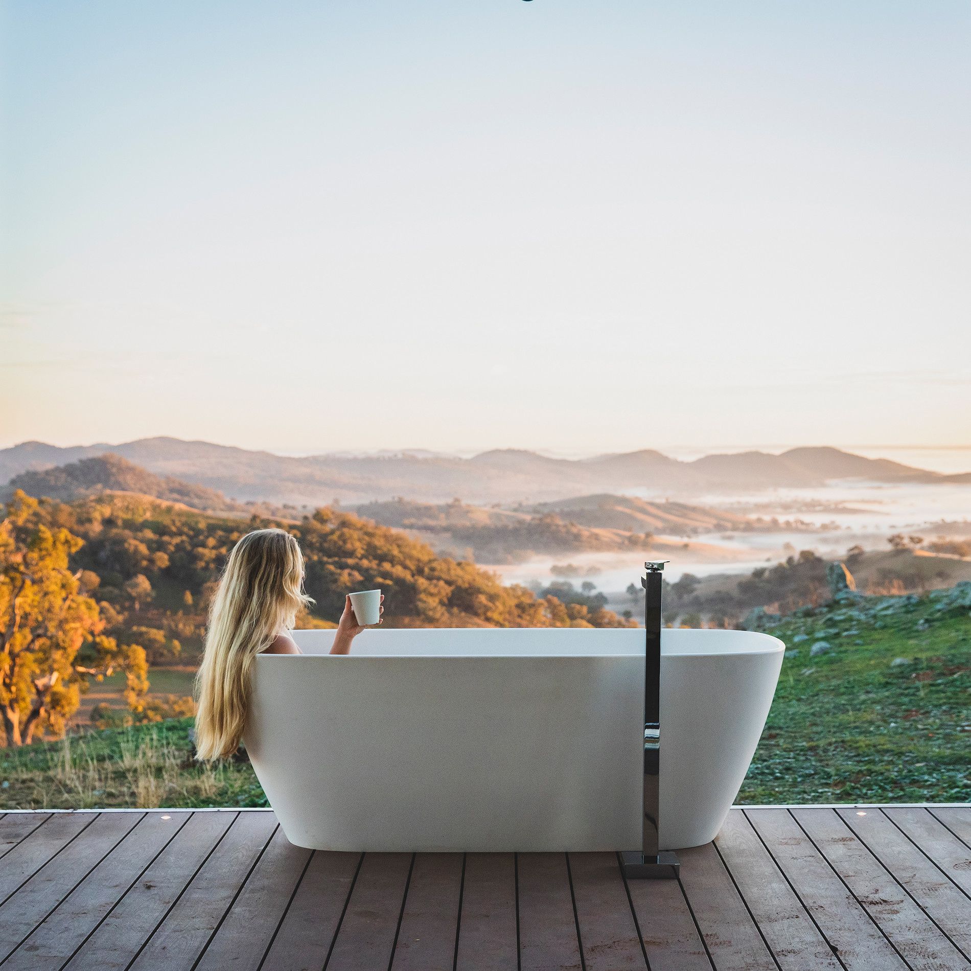 Woman in an outdoor tub near Mudgee