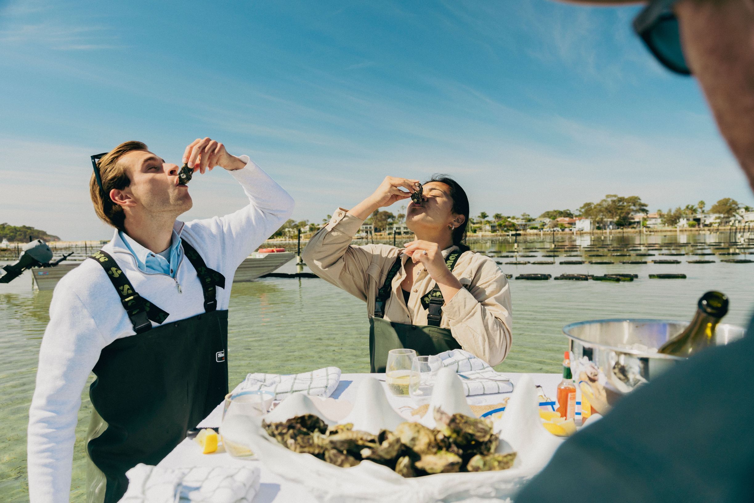 Visitors enjoying an in-water oyster experience