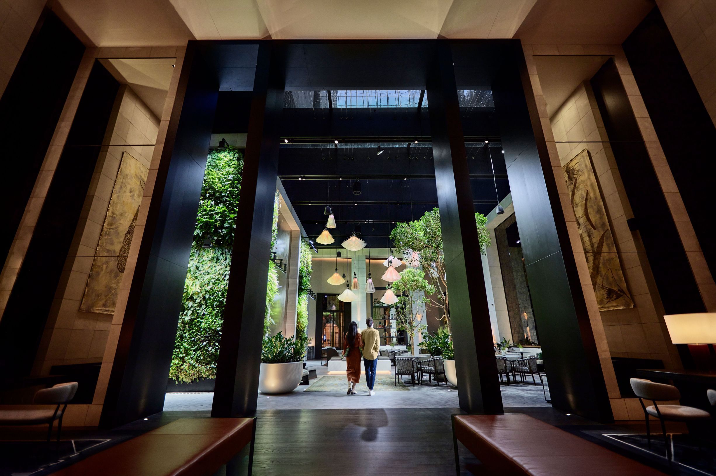 Couple walking into Capella Sydney