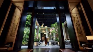 Couple walking into Capella Sydney