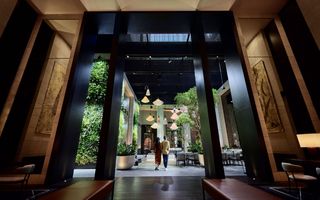 Couple walking into Capella Sydney
