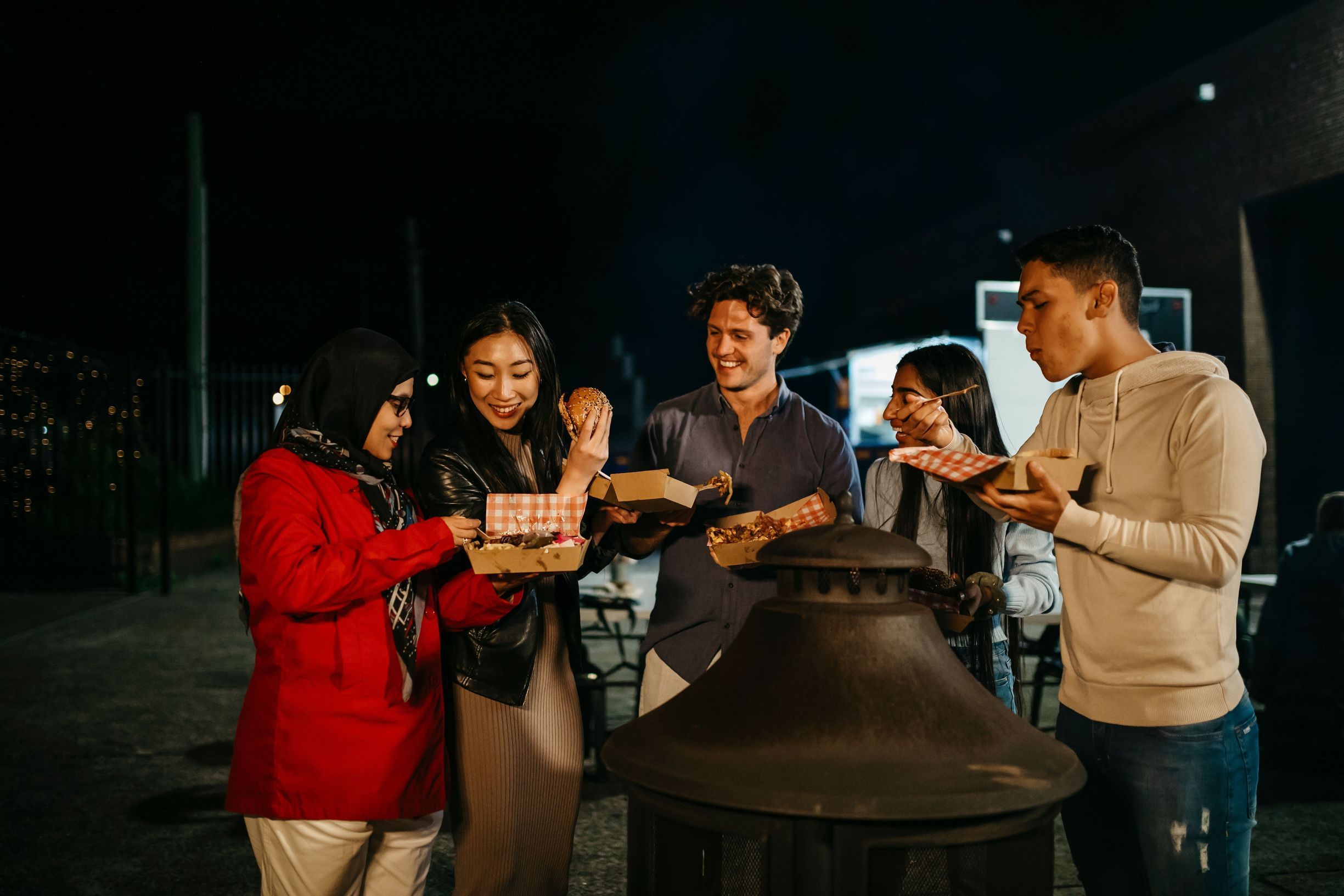 Group of friends eating food in Bankstown