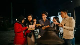 Group of friends eating food in Bankstown