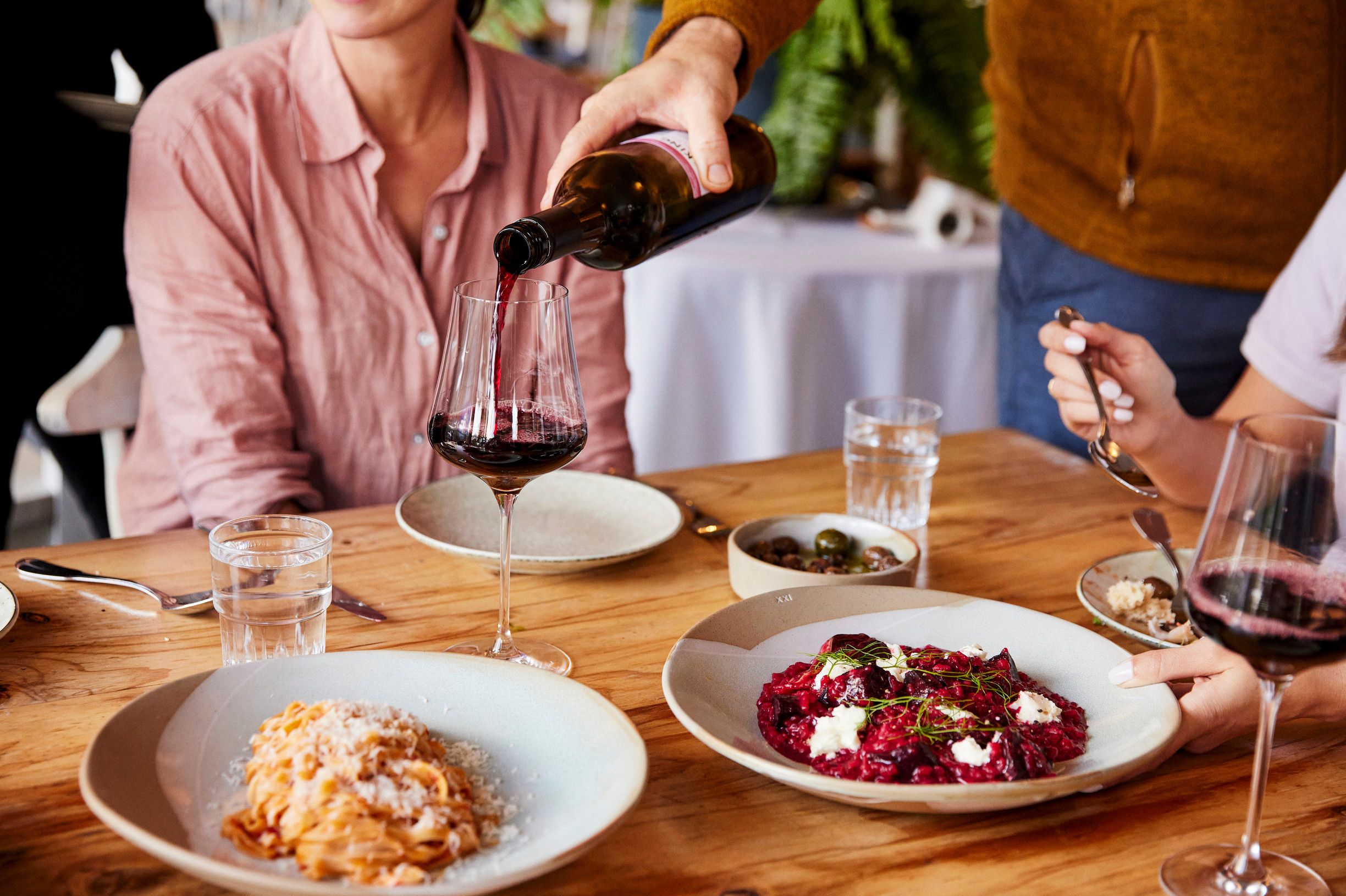 Sommelier pouring wine