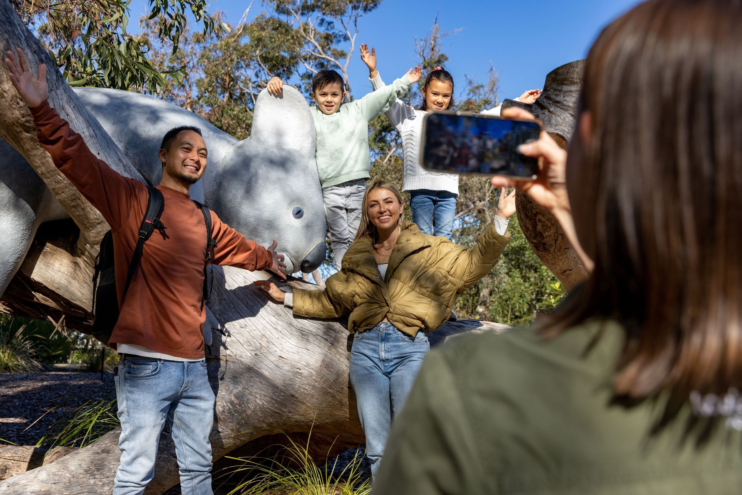 Family enjoying a visit to the Koala Sanctuary Port Stephens, One Mile.