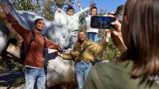 Family enjoying a visit to the Koala Sanctuary Port Stephens, One Mile.
