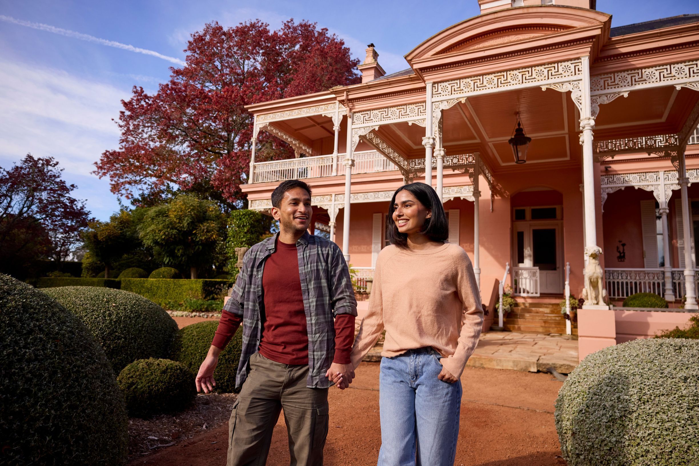 Couple visiting the grounds of Retford Park, Bowral