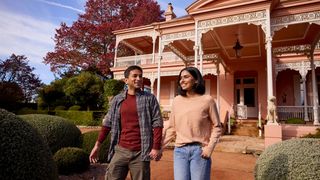 Couple visiting the grounds of Retford Park, Bowral