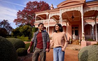 Couple visiting the grounds of Retford Park, Bowral
