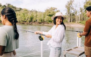Woman fishing at Tweed Heads