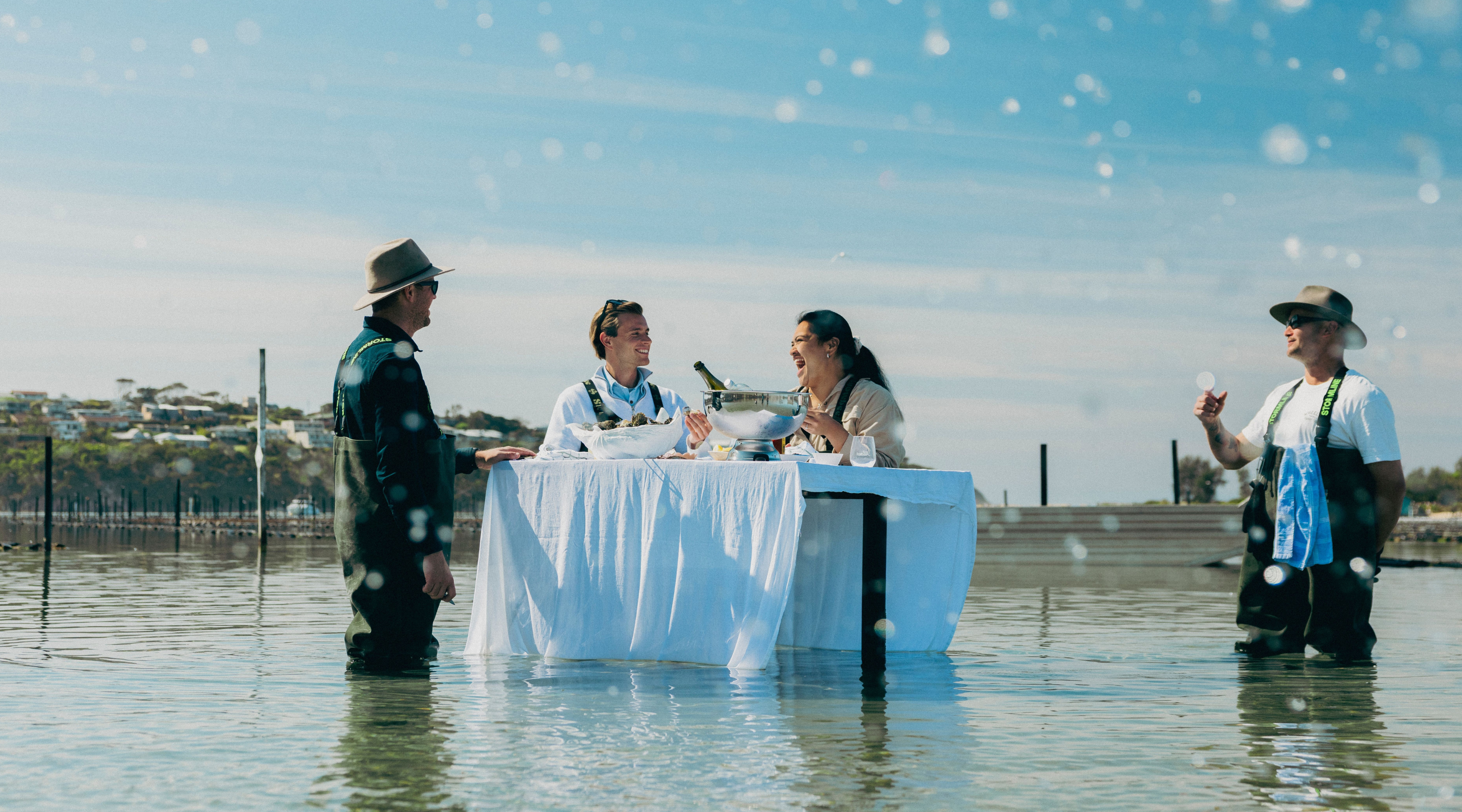 Visitors enjoying in-water oyster experience