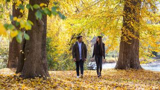 Couple enjoying the autumn colours along the Tumut River walk
