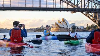 Sydney By Kayak founder Laura Stone taking a tour on Sydney Harbour