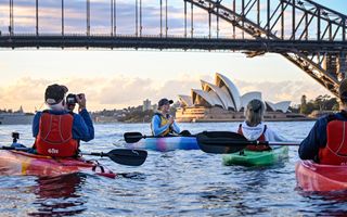 Sydney By Kayak founder Laura Stone taking a tour on Sydney Harbour