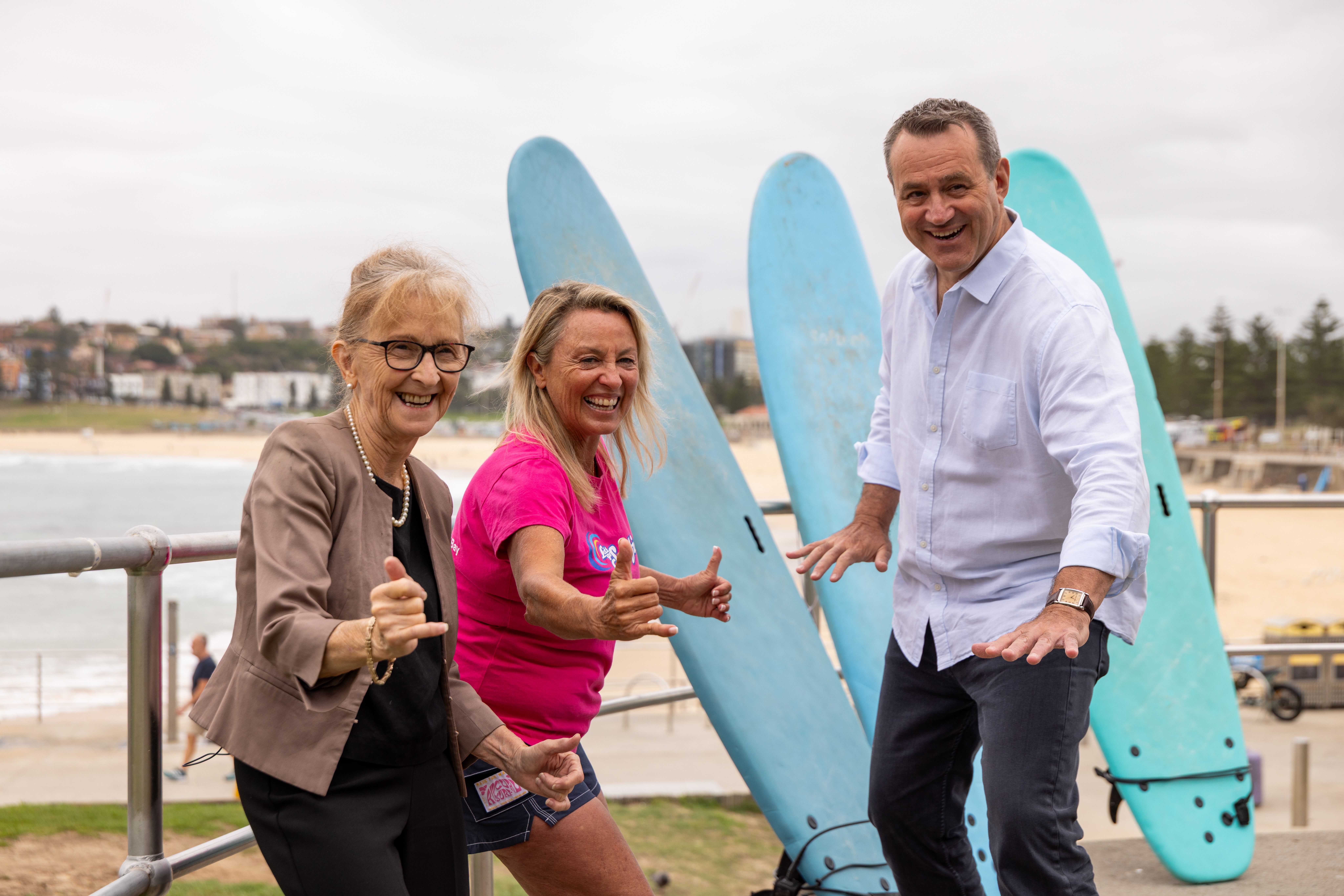 Minister for Small Business Janelle Saffin, Let's Go Surfing founder Brenda Miley and Minister for Jobs and Tourism Steve Kamper