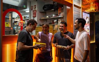 Friends enjoying food in Chinatown