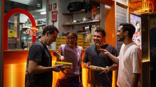 Friends enjoying food in Chinatown