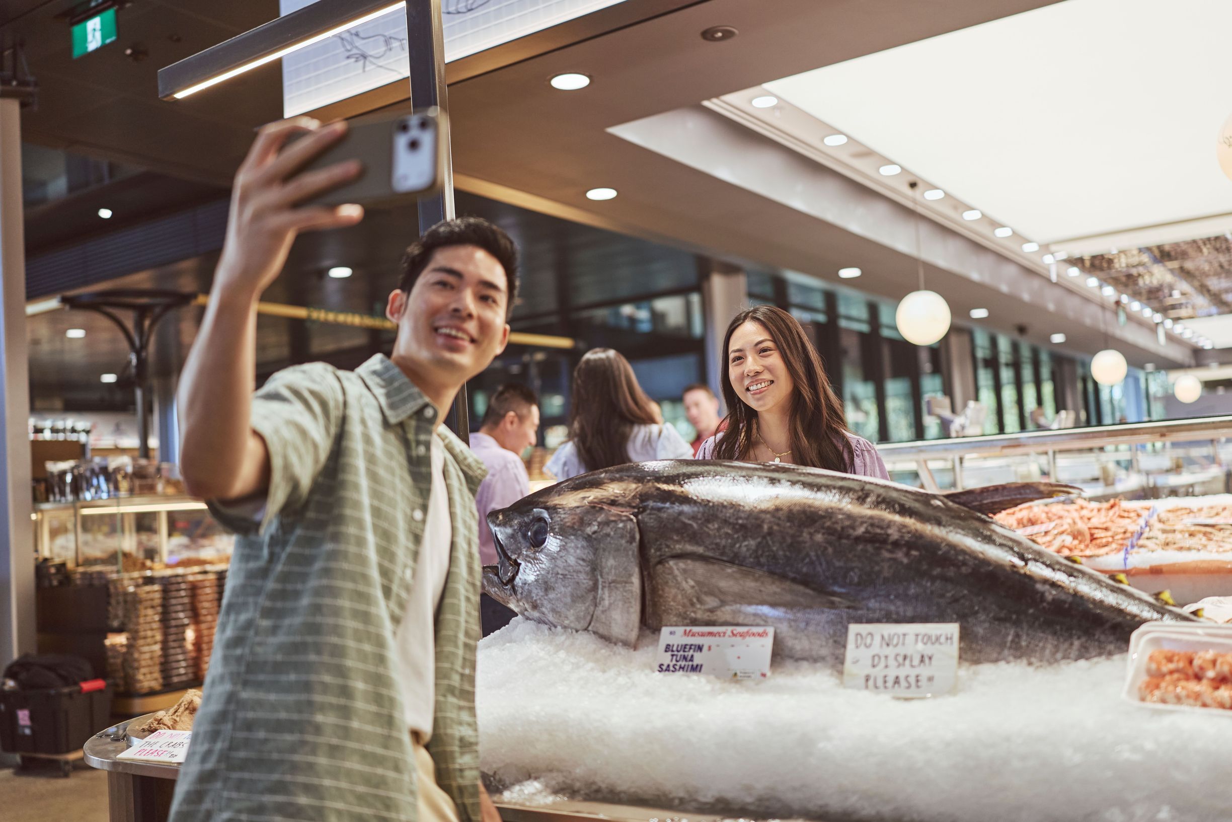 Couple visits the Sydney Fish Markets in Glebe